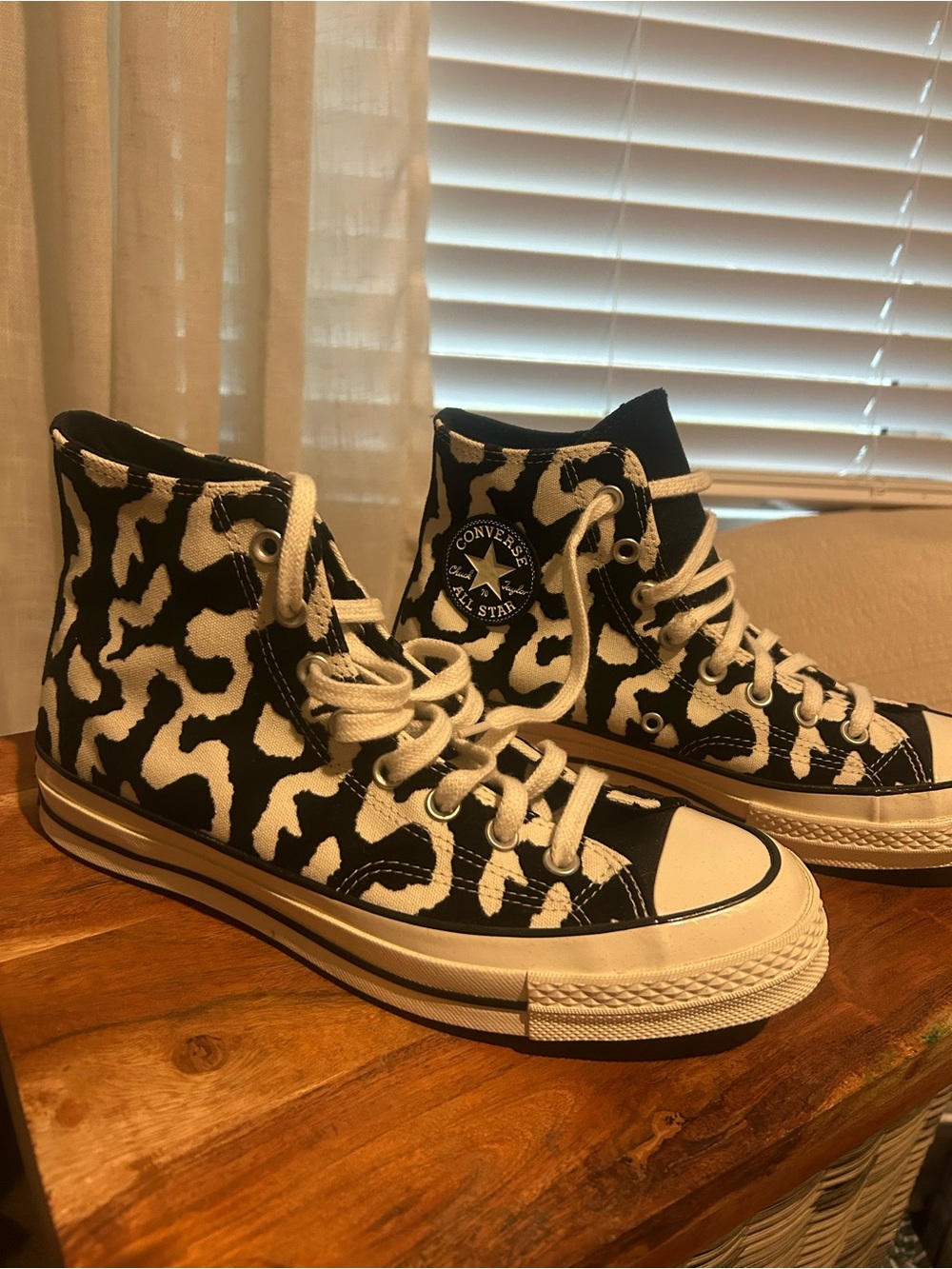 Converse Black and White Cow Print High-Top Sneakers